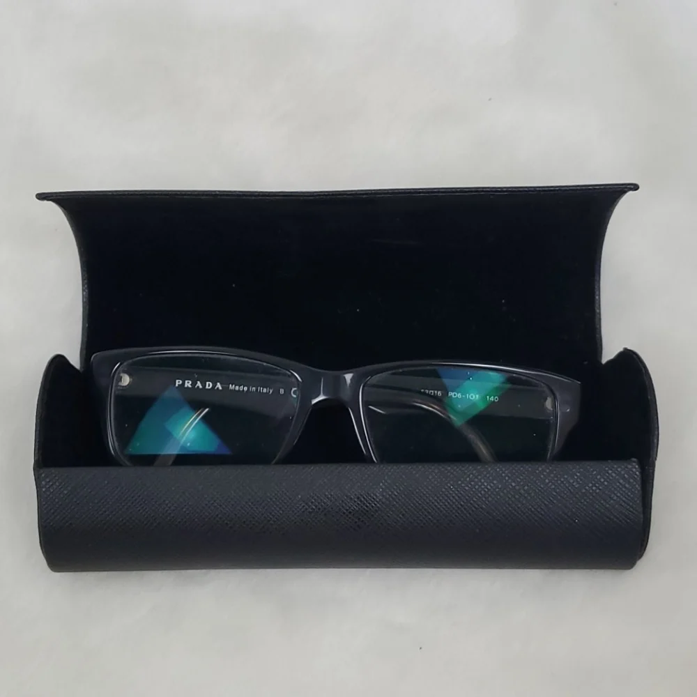 Prada used +2